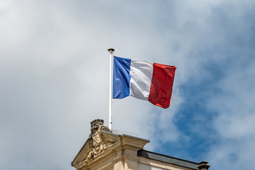 Blue,Red,White,French,Flag,On,Roof,Of,Ciry,Hall